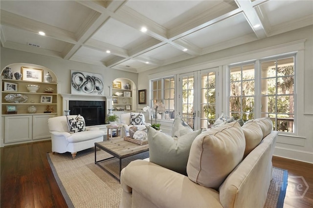 120 Marsh Harbor Dr S, Savannah, GA 31410 - living area featuring beam ceiling, dark wood-style floors, a fireplace with raised hearth, coffered ceiling, and built in features
