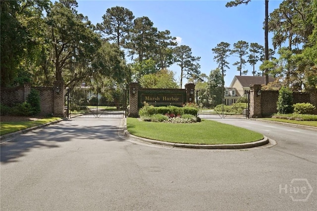 120 Marsh Harbor Dr S, Savannah, GA 31410 - community / neighborhood sign featuring a gate and driveway