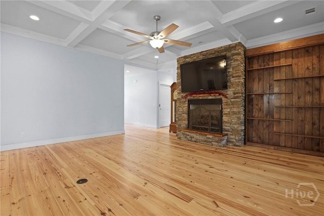 206 Captain Cone Ct, Brooklet, GA 30415 - unfurnished living room featuring coffered ceiling, hardwood / wood-style floors, beamed ceiling, ceiling fan, and a stone fireplace