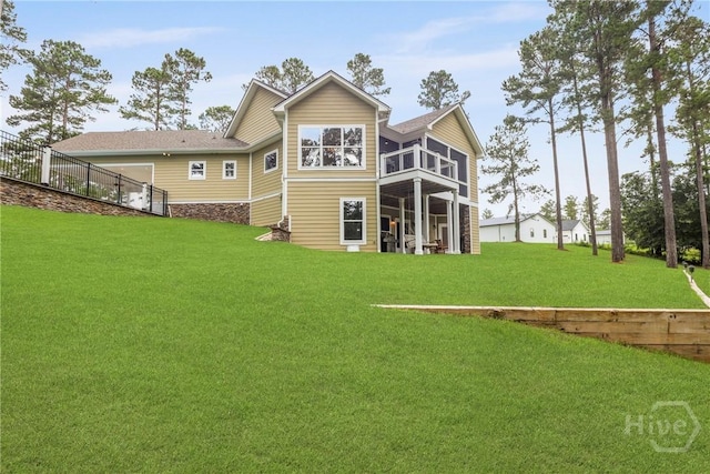 206 Captain Cone Ct, Brooklet, GA 30415 - back of property with a yard and a sunroom