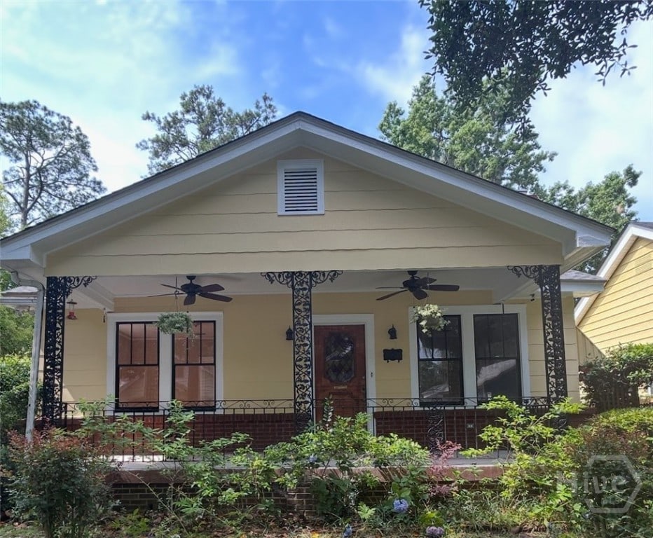 1319 E 39th St E, Savannah, GA 31404 - view of front of property with a ceiling fan, covered porch, and brick siding