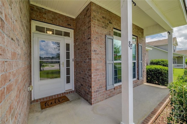 82 Saddlebrush Rd, Ellabell, GA 31308 - entrance to property with brick siding and a porch