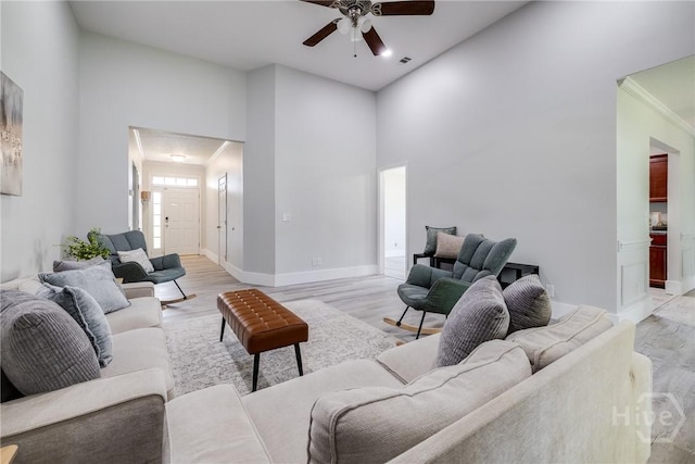 82 Saddlebrush Rd, Ellabell, GA 31308 - living room with light wood-style floors, baseboards, and ceiling fan