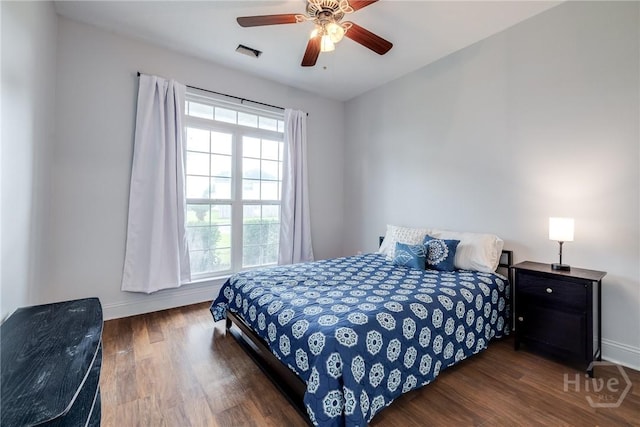 82 Saddlebrush Rd, Ellabell, GA 31308 - bedroom featuring baseboards, wood finished floors, and ceiling fan