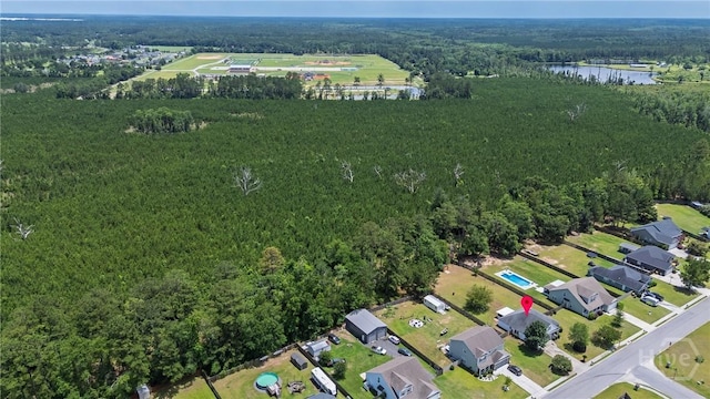 82 Saddlebrush Rd, Ellabell, GA 31308 - aerial view of property and surrounding area featuring a forest and a large body of water