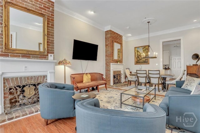 509 E Broughton St, Savannah, GA 31401 - living room with a fireplace, wood finished floors, and crown molding
