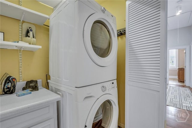 509 E Broughton St, Savannah, GA 31401 - laundry area featuring stacked washer / dryer