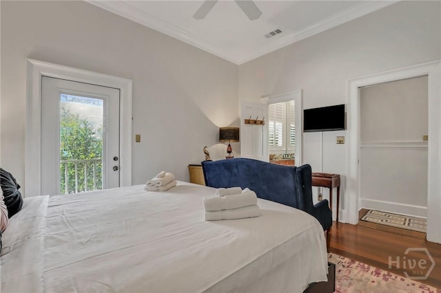 509 E Broughton St, Savannah, GA 31401 - bedroom featuring access to outside, wood finished floors, crown molding, and a ceiling fan