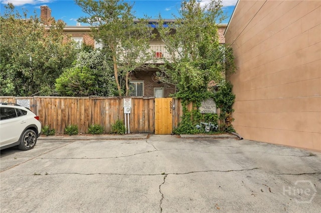 509 E Broughton St, Savannah, GA 31401 - uncovered parking lot with a fenced front yard