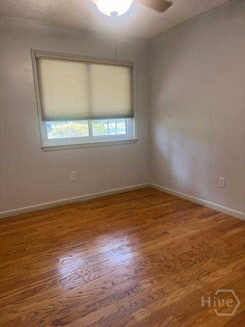 5 Chesterfield Ct, Savannah, GA 31419 - unfurnished room with wood finished floors, baseboards, and ceiling fan