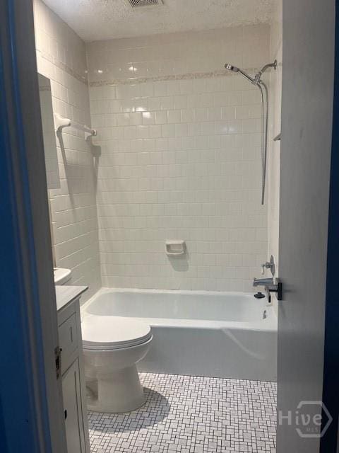5 Chesterfield Ct, Savannah, GA 31419 - full bath featuring vanity, toilet, shower / tub combination, tile patterned flooring, and a textured ceiling