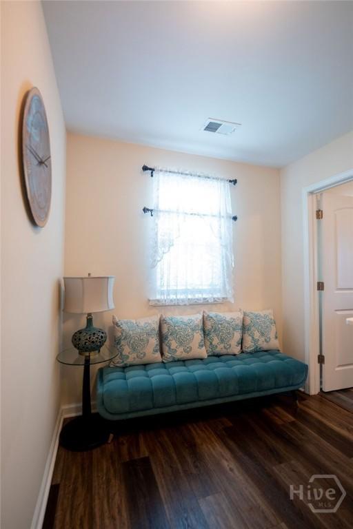 66 Tarbert Cut Cut, Richmond Hill, GA 31324 - living area with wood finished floors and baseboards