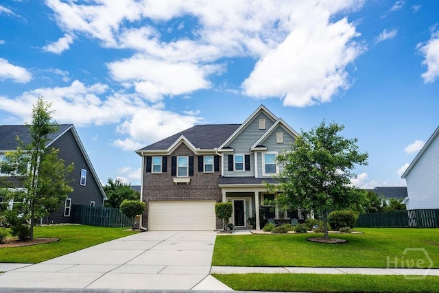 66 Tarbert Cut Cut, Richmond Hill, GA 31324 - view of front of home featuring driveway, an attached garage, and brick siding