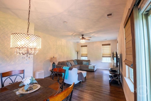 66 Tarbert Cut Cut, Richmond Hill, GA 31324 - dining room featuring dark wood finished floors, a ceiling fan, baseboards, and a chandelier