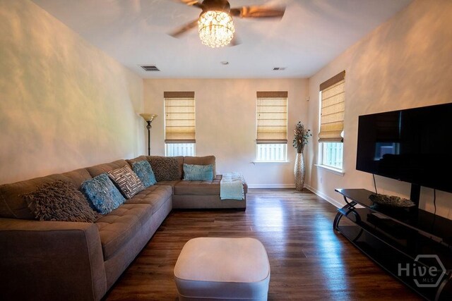 66 Tarbert Cut Cut, Richmond Hill, GA 31324 - living area featuring a ceiling fan, wood finished floors, and baseboards