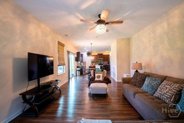 66 Tarbert Cut Cut, Richmond Hill, GA 31324 - living area with ceiling fan, dark wood-type flooring, and baseboards