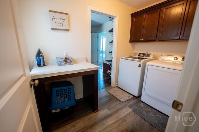 66 Tarbert Cut Cut, Richmond Hill, GA 31324 - washroom with cabinet space, washer and clothes dryer, and wood finished floors