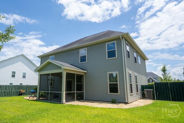 66 Tarbert Cut Cut, Richmond Hill, GA 31324 - rear view of house featuring a sunroom and central AC unit