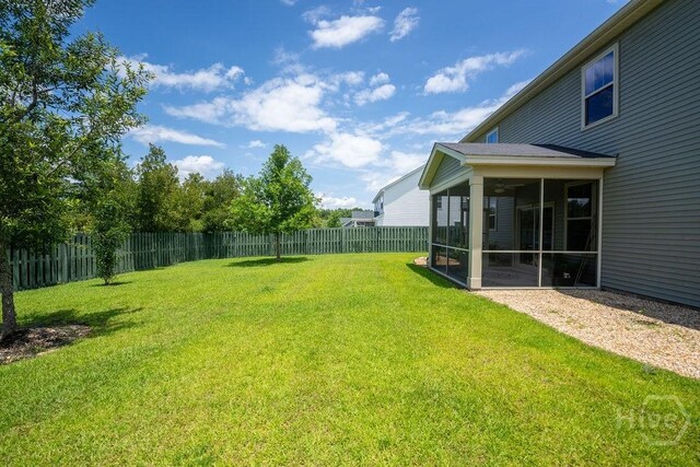 66 Tarbert Cut Cut, Richmond Hill, GA 31324 - view of yard featuring a sunroom