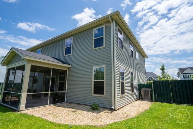 66 Tarbert Cut Cut, Richmond Hill, GA 31324 - back of property featuring a sunroom