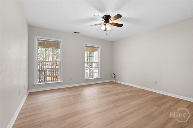 800 N Taylor Ct, Statesboro, GA 30461 - empty room featuring light wood-type flooring, a ceiling fan, and baseboards