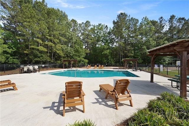 301 Morgan Pines Dr, Pooler, GA 31322 - community pool with a pergola, a patio, and view of wooded area