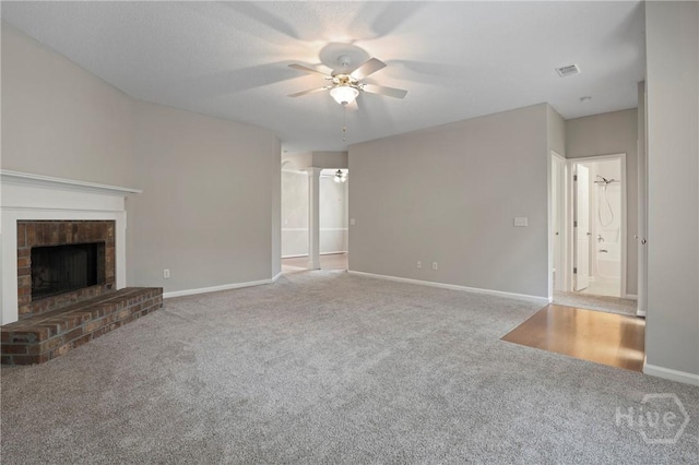 301 Morgan Pines Dr, Pooler, GA 31322 - unfurnished living room with ceiling fan, carpet, a brick fireplace, and baseboards