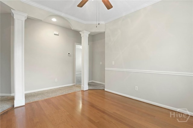 301 Morgan Pines Dr, Pooler, GA 31322 - empty room with ornate columns, a ceiling fan, baseboards, wood finished floors, and crown molding