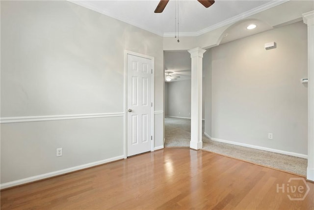 301 Morgan Pines Dr, Pooler, GA 31322 - empty room with decorative columns, ceiling fan, wood finished floors, baseboards, and crown molding