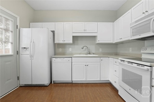 301 Morgan Pines Dr, Pooler, GA 31322 - kitchen featuring white appliances, a sink, and white cabinets