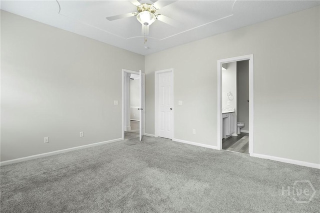 301 Morgan Pines Dr, Pooler, GA 31322 - unfurnished bedroom with carpet flooring, baseboards, connected bathroom, and a ceiling fan