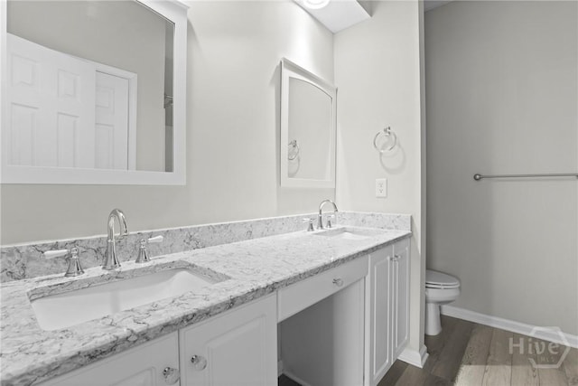 301 Morgan Pines Dr, Pooler, GA 31322 - full bath featuring double vanity, wood finished floors, toilet, and baseboards