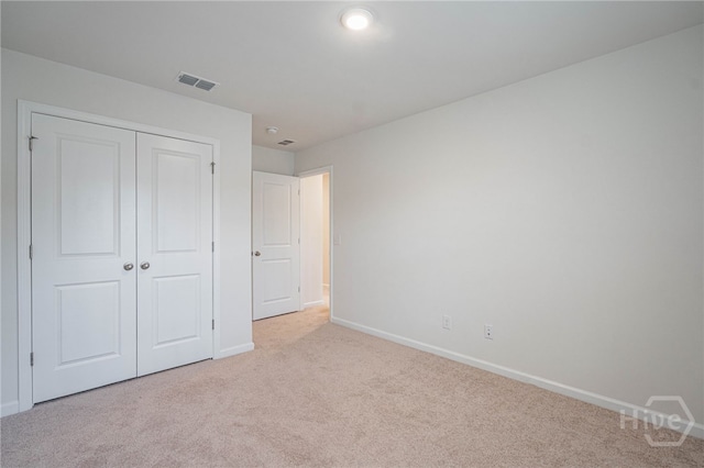 147 Congo Ct, Pooler, GA 31322 - unfurnished bedroom featuring light carpet, baseboards, and a closet