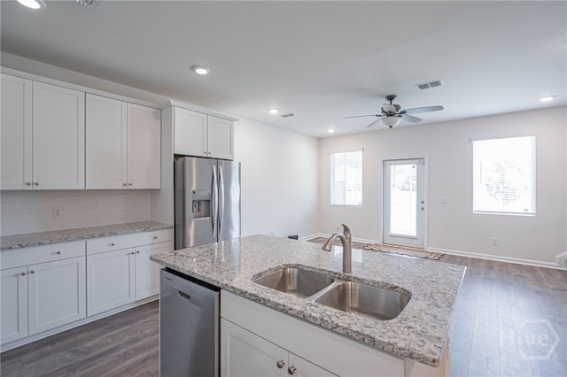147 Congo Ct, Pooler, GA 31322 - kitchen featuring appliances with stainless steel finishes, a sink, dark wood-style floors, white cabinetry, and recessed lighting