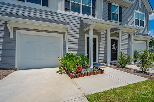 147 Congo Ct, Pooler, GA 31322 - entrance to property with an attached garage and driveway