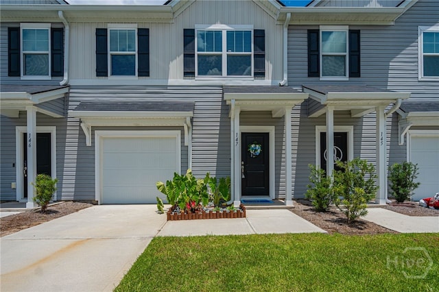147 Congo Ct, Pooler, GA 31322 - townhome / multi-family property with a garage and concrete driveway