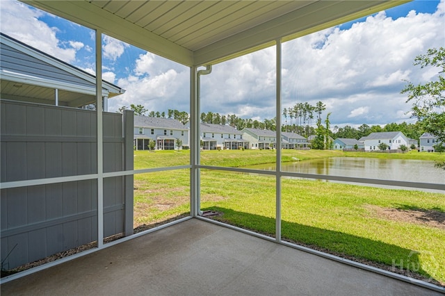 147 Congo Ct, Pooler, GA 31322 - unfurnished sunroom with a residential view and a water view
