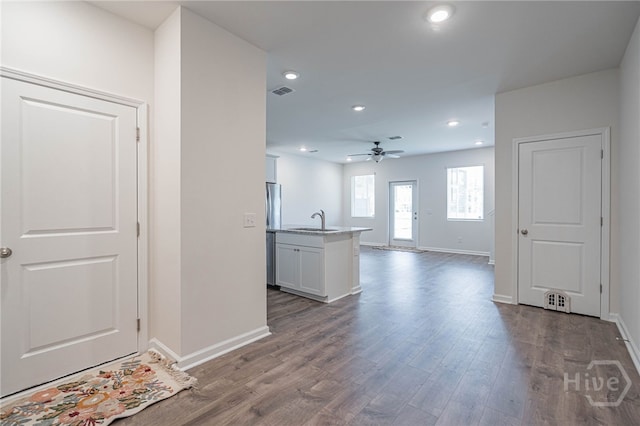 147 Congo Ct, Pooler, GA 31322 - unfurnished living room with a sink, a ceiling fan, baseboards, dark wood-style floors, and recessed lighting