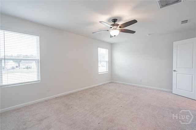 147 Congo Ct, Pooler, GA 31322 - spare room with a ceiling fan, light carpet, and baseboards