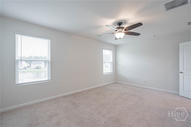 147 Congo Ct, Pooler, GA 31322 - unfurnished room featuring a ceiling fan, light colored carpet, and baseboards
