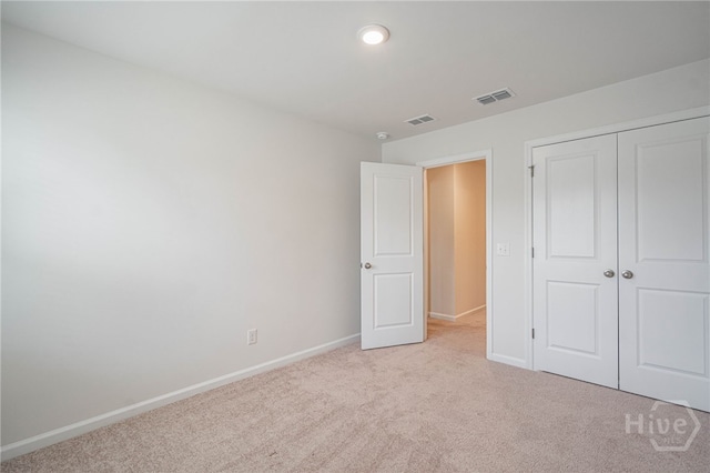 147 Congo Ct, Pooler, GA 31322 - unfurnished bedroom featuring light colored carpet, baseboards, a closet, and recessed lighting