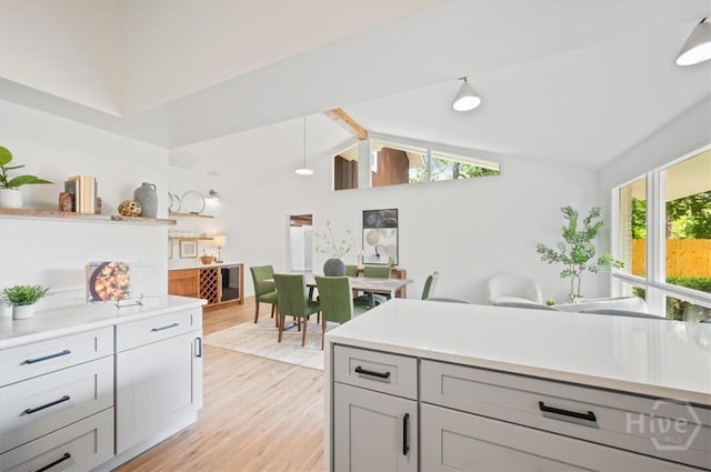 4750 Sylvan Dr, Savannah, GA 31405 - kitchen featuring light wood finished floors, light countertops, and gray cabinetry