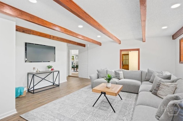 4750 Sylvan Dr, Savannah, GA 31405 - living area with recessed lighting, beam ceiling, wood finished floors, and baseboards
