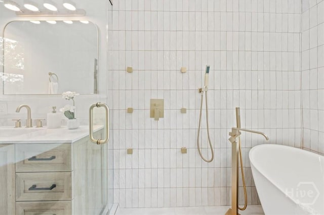 4750 Sylvan Dr, Savannah, GA 31405 - full bath with tile walls, a soaking tub, a shower stall, and vanity