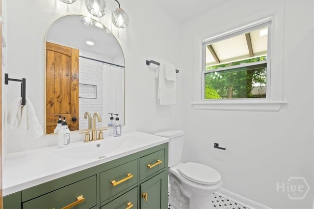 4750 Sylvan Dr, Savannah, GA 31405 - full bathroom featuring vanity, toilet, and baseboards