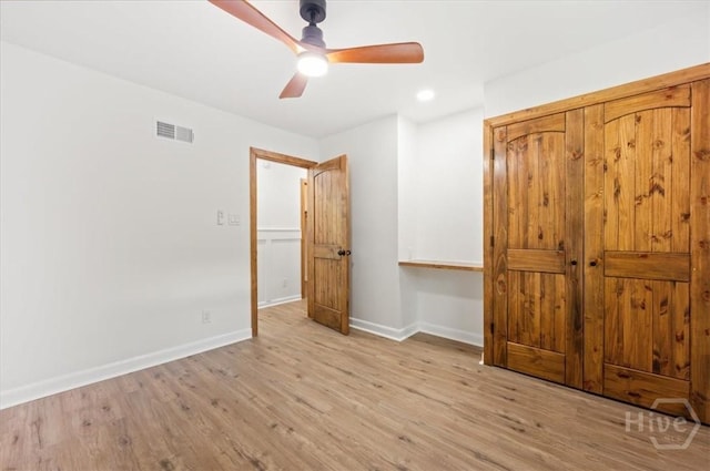 4750 Sylvan Dr, Savannah, GA 31405 - unfurnished bedroom featuring baseboards, wood finished floors, a ceiling fan, and recessed lighting