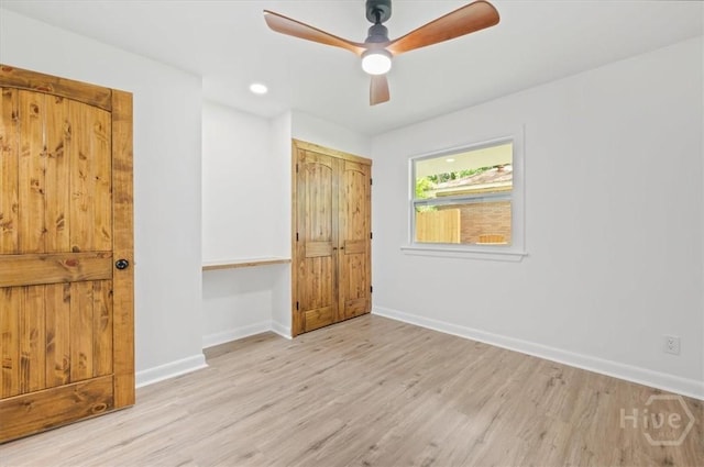 4750 Sylvan Dr, Savannah, GA 31405 - unfurnished bedroom featuring wood finished floors, baseboards, ceiling fan, recessed lighting, and a closet