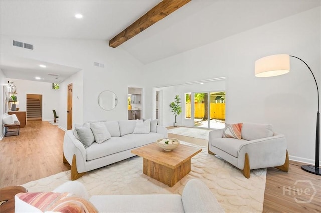 4750 Sylvan Dr, Savannah, GA 31405 - living room featuring light wood-style floors, beam ceiling, baseboards, recessed lighting, and high vaulted ceiling