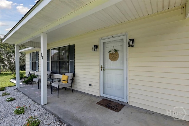 151 Ogeechee Ave, Bloomingdale, GA 31302 - property entrance featuring a porch