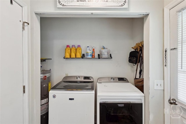 151 Ogeechee Ave, Bloomingdale, GA 31302 - washroom with washer and clothes dryer and water heater